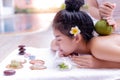 Charming beautiful asian woman love to get massage and aromatherapy that makes attractive beautiful girl feels relaxed and happy. Royalty Free Stock Photo