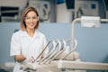 Charming beautiful woman dentist at work place Royalty Free Stock Photo