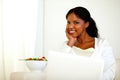 Charming black woman looking and smiling at you Royalty Free Stock Photo