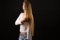 Charming blond teenager girl with long hair