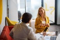 Positive delighted employer talking to her future colleague Royalty Free Stock Photo