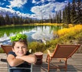 The charming boy sits on small circular lake