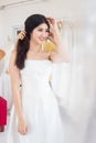 Charming bride dressing up To get married at wedding studio