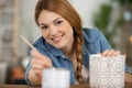 charming brunette woman working on ceramic workshop Royalty Free Stock Photo