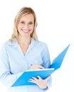 Charming businesswoman holding a folder smiling