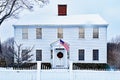 White Colonial Historic House in Winter Royalty Free Stock Photo