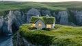 A charming cottage with a grass-covered roof glows warmly at night, nestled on a cliff by the ocean, inviting Royalty Free Stock Photo