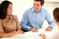 Charming couple interested in a contract Royalty Free Stock Photo