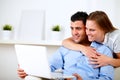 Charming couple using laptop together Royalty Free Stock Photo