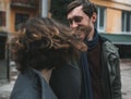 Charming couple walking down the street