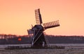 Charming Dutch windmill during sunset