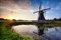 Charming Dutch windmill at sunset