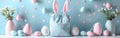 Easter Bunny Greetings: Festive Fabric Gift Bag with Eggs and Ears on White Table - Happy Easter Decoration Concept Royalty Free Stock Photo