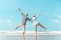 Charming elderly couple went to the beach to enjoy the sea breeze Royalty Free Stock Photo