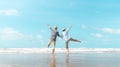 Charming elderly couple went to the beach to enjoy the sea breeze Royalty Free Stock Photo