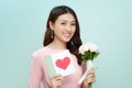 Charming elegant and feminine young woman receive flowers