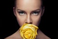 Charming face with rapier glance. yellow rose.