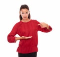 Charming female pointing and holding her palm up Royalty Free Stock Photo