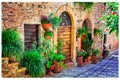 Charming floral decorated streets of medieval towns of Italy. Sp Royalty Free Stock Photo