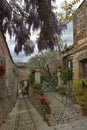 Charming floral narrow streets of typical italian village Royalty Free Stock Photo