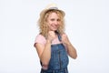 Charming funny caucasian woman raising fists, standing in boxer pose