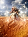 A charming girl, blonde, in a white dress with lace, stands in a golden field with rye. A harvest sorceress with a flower. Royalty Free Stock Photo