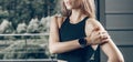 Charming girl posing with a smart watch. No name portrait. The concept of bodybuilding, fitness, healthy lifestyle