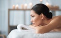 Charming girl is resting in spa salon Royalty Free Stock Photo