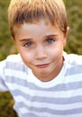 Charming his way around. Closeup portrait of happy young boy smiling. Royalty Free Stock Photo