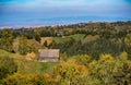 Charming home nestled amidst a picturesque, verdant hillside with a lush carpet of greenery Royalty Free Stock Photo