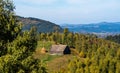 Charming home nestled amidst a picturesque, verdant hillside with a lush carpet of greenery Royalty Free Stock Photo