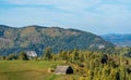 Charming home nestled amidst a picturesque, verdant hillside with a lush carpet of greenery Royalty Free Stock Photo