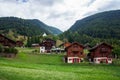 Charming houses dotting the Swiss Alps in Switzerland