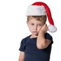 The charming little boy in red cap of Santa Claus Royalty Free Stock Photo