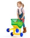 Charming little girl with a toy truck. Royalty Free Stock Photo