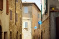 Charming medieval street of Montalcino town, located on top of a hill top and surrounded by vineyards, known worldwide for the