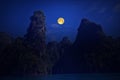 Charming moon over mountains and lake Royalty Free Stock Photo