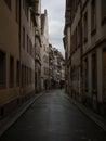 Charming narrow alley lane street with old traditional houses buildings in Strasbourg Grand Est Bas Rhin Alsace France Royalty Free Stock Photo