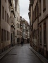 Charming narrow alley lane street with old traditional houses buildings in Strasbourg Grand Est Bas Rhin Alsace France Royalty Free Stock Photo