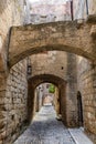 Charming narrow street in the old town of Rhodes, Greece