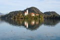 the charming natural scenery of Lake Bled with Alps at background and blue water