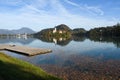 the charming natural scenery of Lake Bled with Alps at background and blue water