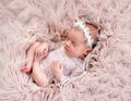 Charming newborn wearing lace suit