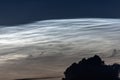 charming night landscape with silver clouds, silver clouds, mesospheric clouds Royalty Free Stock Photo
