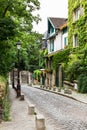 Charming old street of Montmartre hill. Paris, France Royalty Free Stock Photo