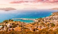 Panoramic aerial view of seaside resort town of Kas in Turkey. Harbor with port and white houses with orange roofs Royalty Free Stock Photo