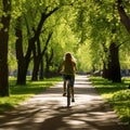 Carefree woman enjoys a bike ride through a lush green park embracing spring vitality