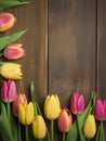 Spring Tulip Border on Vintage Green Wooden Background, Pink and Yellow Flowers, Copy Space