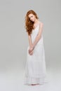 Charming redhead woman in dress