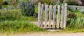Charming rustic wooden fence of a small organic village backyard